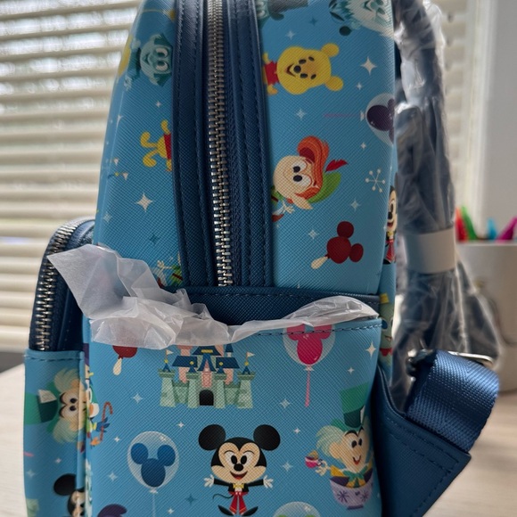 disney parks icons mini backpack by loungefly Chibi Accented with metallic golden bow and trim Disney Parks Snacks Loungefly Mini